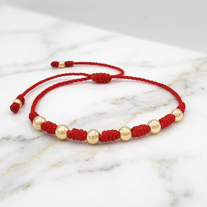 BRAZALETE 7 NUDOS DE PROTECCIÓN BALIN LISO ROJO