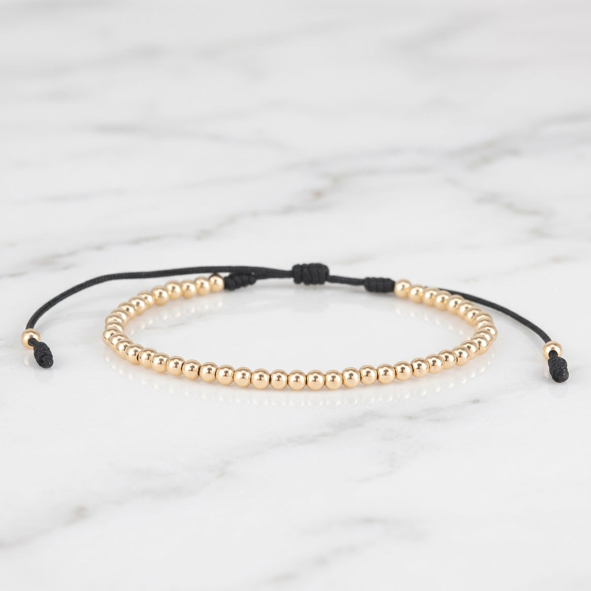 BRAZALETE FULL BALINES 3MM DORADO NEGRO