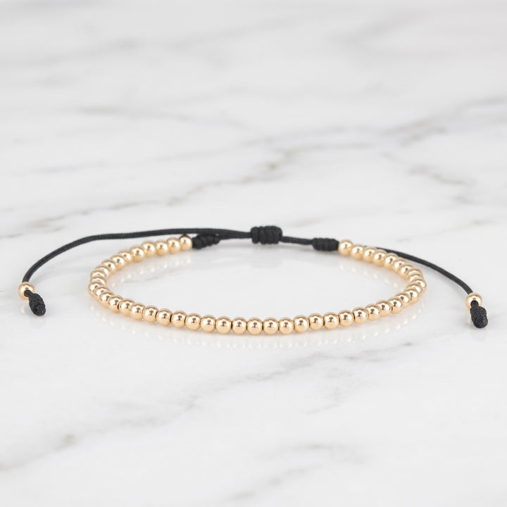 BRAZALETE FULL BALINES 3MM DORADO NEGRO