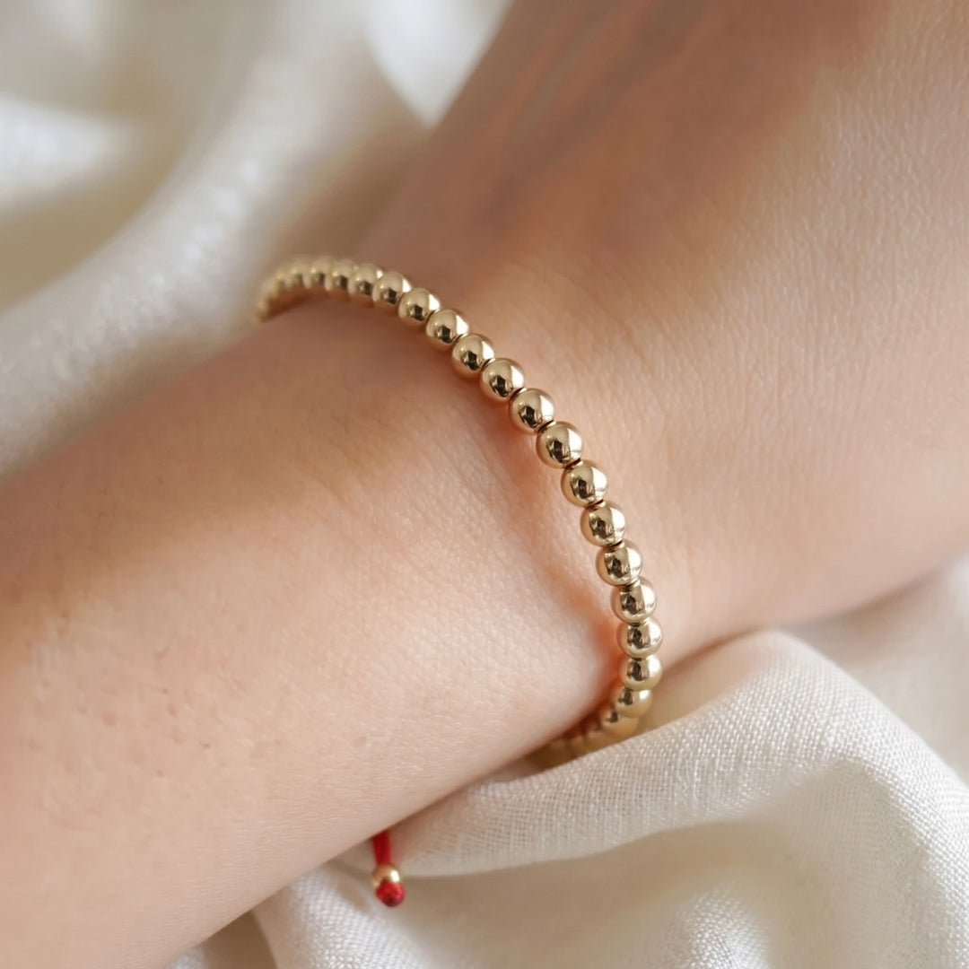 BRAZALETE FULL BALINES 4MM DORADO ROJO