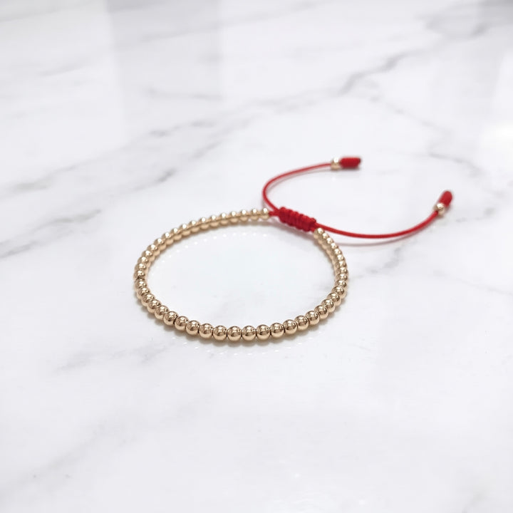 BRAZALETE FULL BALINES 4MM DORADO ROJO