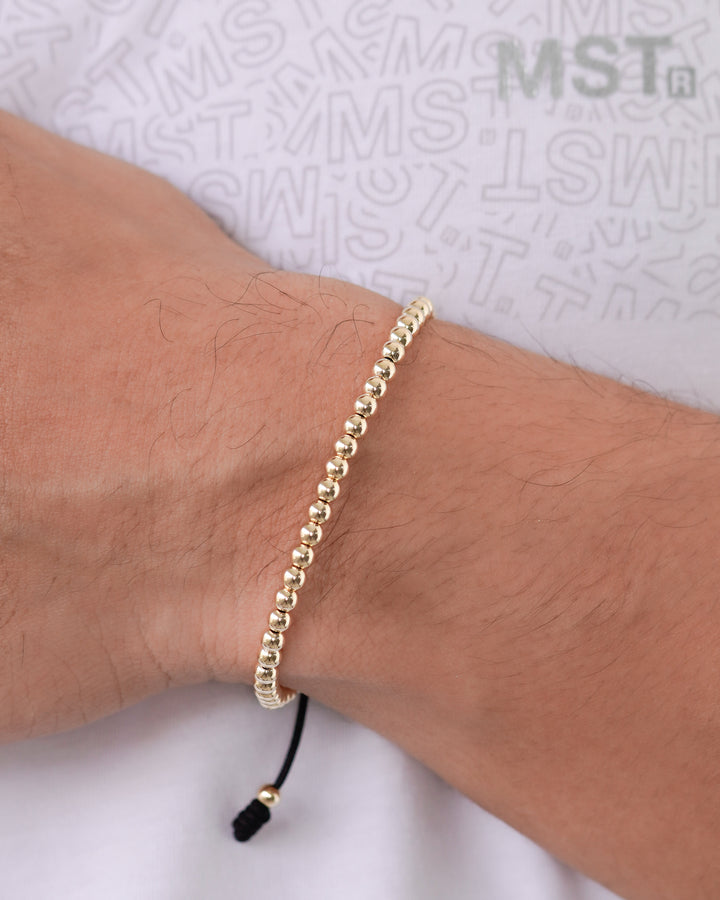 BRAZALETE FULL BALINES 4MM DORADO NEGRO